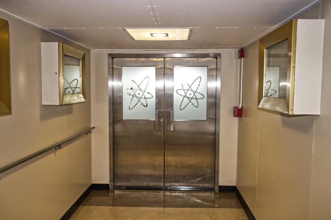 The ship&rsquo;s doors used for boarding continue the theming with &lsquo;atomic&rsquo; symbols.