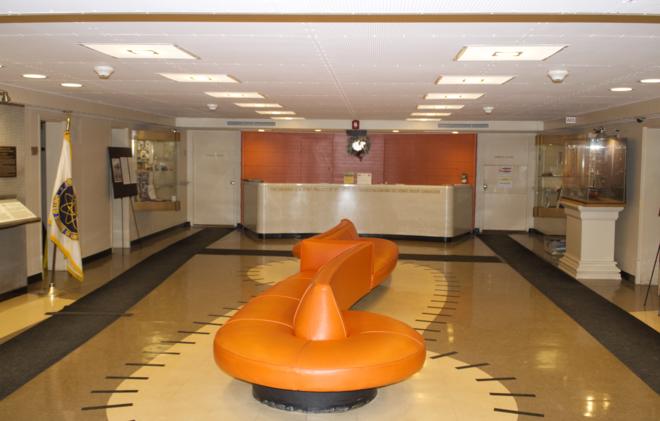 The ship&rsquo;s lobby has an interesting curved couch in a very dated orange vinyl.