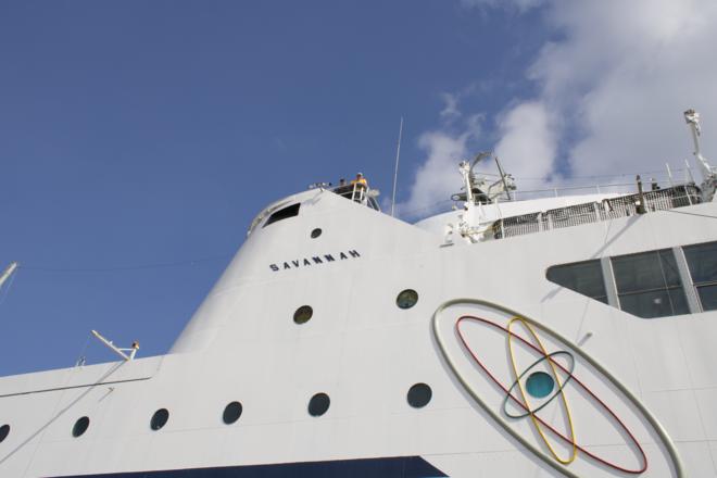 Side view of the NS Savannah showing the large 'atom' logo.