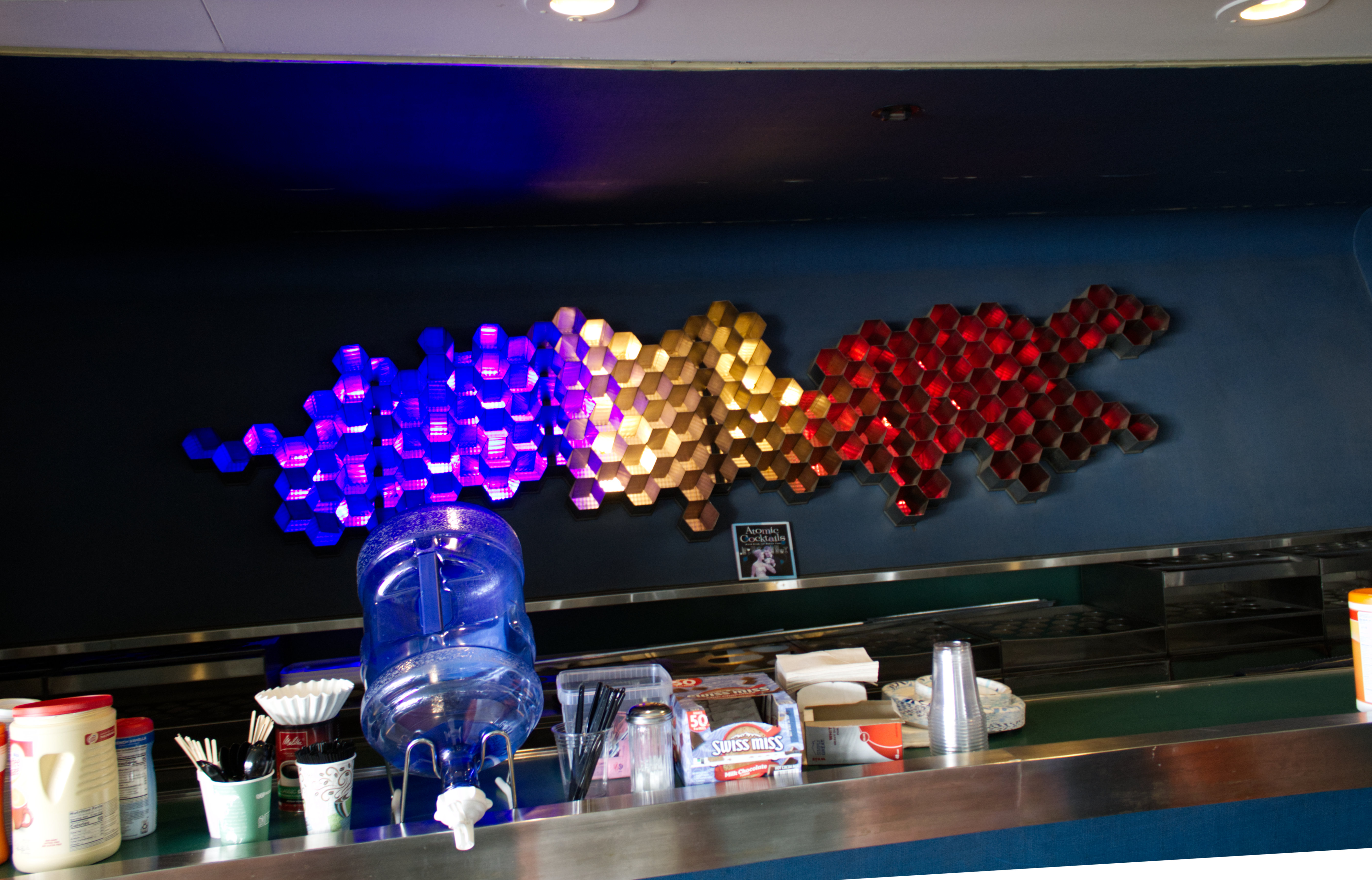 The ship’s bar is decorated with a design made out of hexagons.
