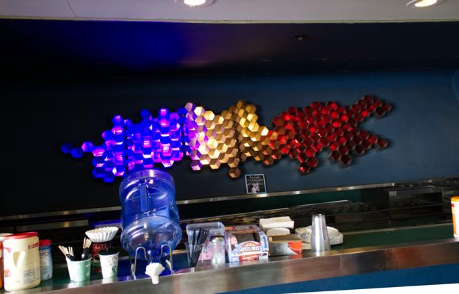 The ship&rsquo;s bar is decorated with a design made out of hexagons.