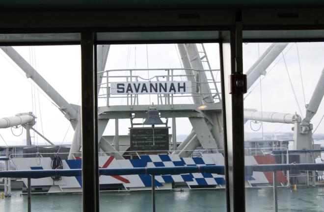 View from the ship&rsquo;s veranda showing the Savannah name and various cargo equipment and masts.