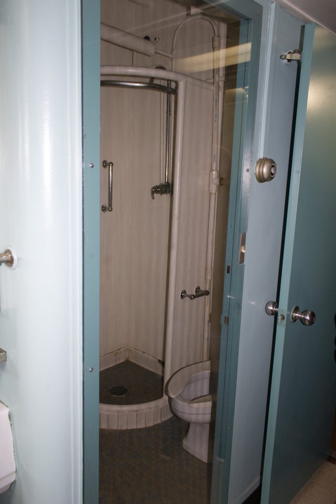 A tiny shower room used by the crew.